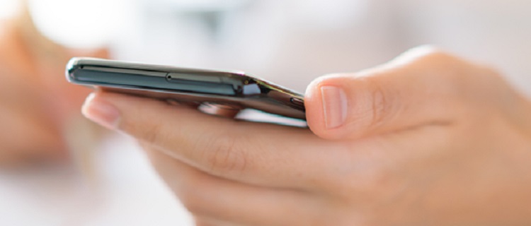 Business hand with mobile phone